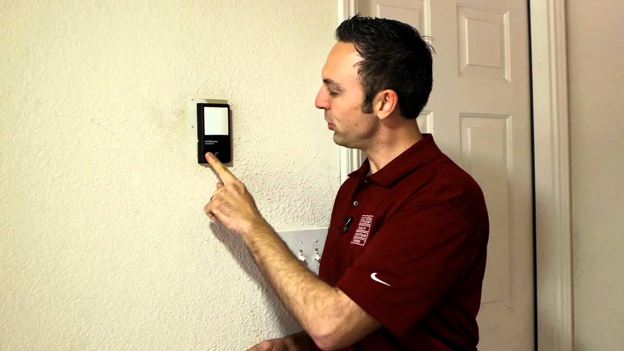 What is the Lock Button on a Garage Door Opener?