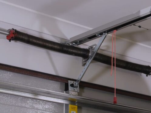 how to adjust a double spring garage door