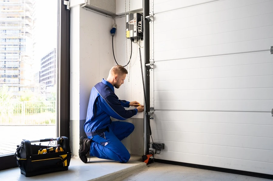how to adjust a double spring garage door