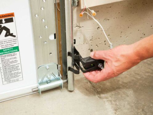 how to repair garage door sensor
