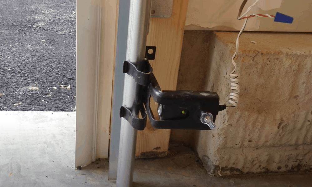 how to repair garage door sensor