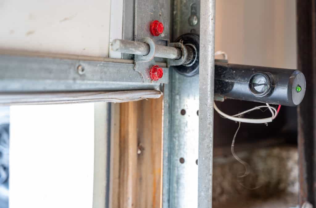 how to repair garage door sensor