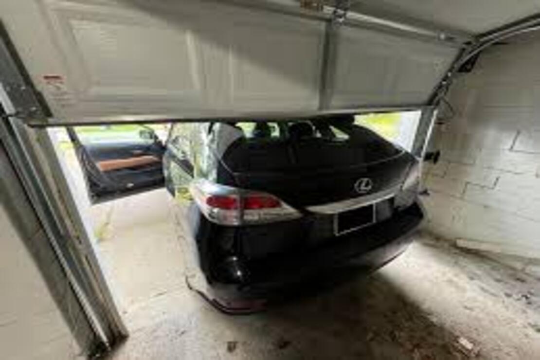 Garage door damage by vehicle